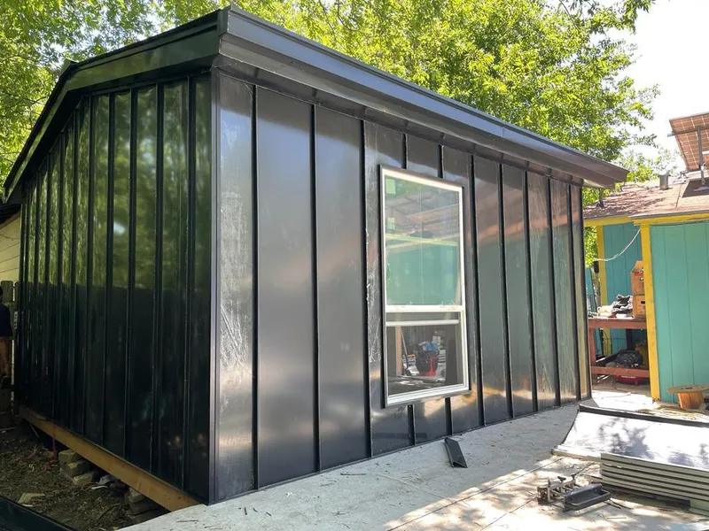 Black standing seam metal wall panels for Roof Inspection in Lake Zurich