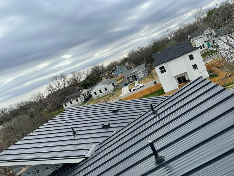 Standing seam metal roof panels with vents for Skylight Repair in Lake Zurich